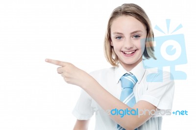 Cute Business Girl Pointing Away Stock Photo