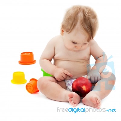 Cute Infant Boy With Apple Stock Photo