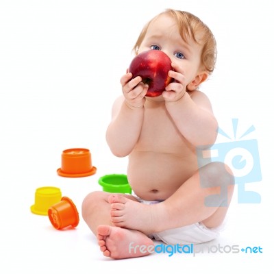 Cute Infant Boy With Apple Stock Photo