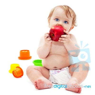 Cute Infant Boy With Apple Stock Photo