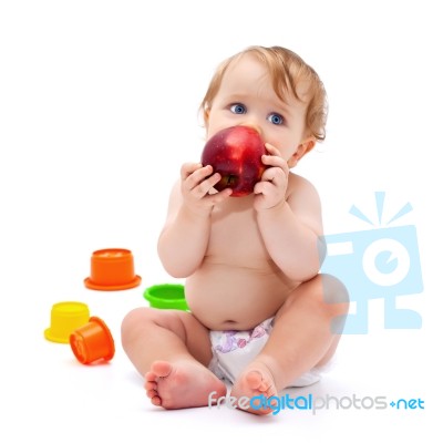 Cute Infant Boy With Apple Stock Photo