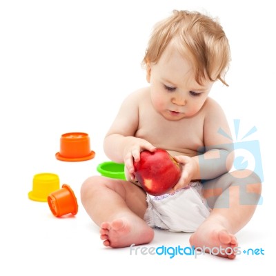 Cute Infant Boy With Apple Stock Photo