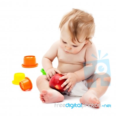 Cute Infant Boy With Apple Stock Photo