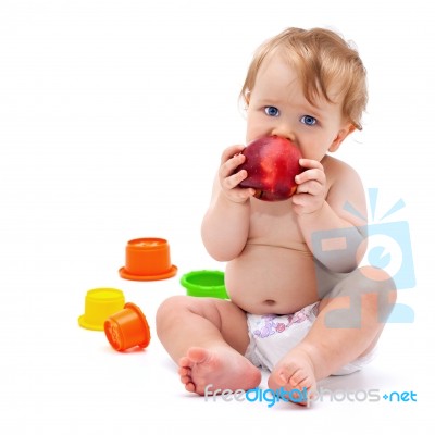 Cute Infant Boy With Apple Stock Photo