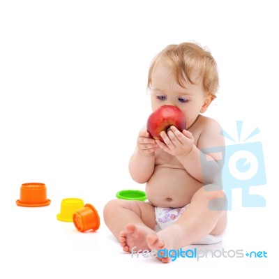 Cute Infant Boy With Apple Stock Photo