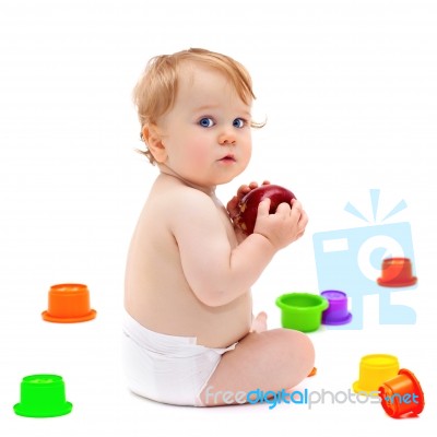 Cute Infant Boy With Apple Stock Photo