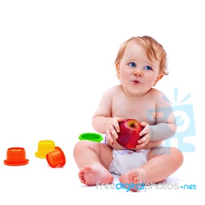 Cute Infant Boy With Apple Stock Photo