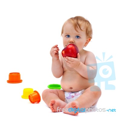 Cute Infant Boy With Apple Stock Photo