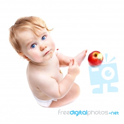 Cute Infant Boy With Apple Stock Photo