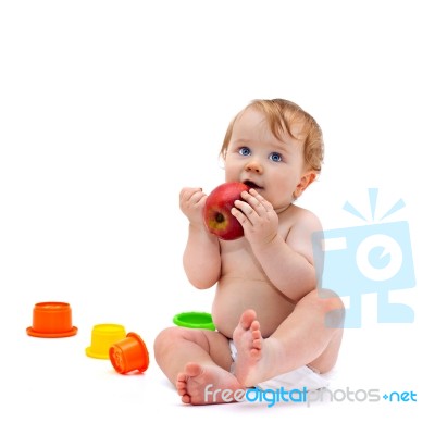 Cute Infant Boy With Apple Stock Photo