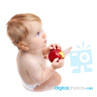 Cute Infant Boy With Apple Stock Photo