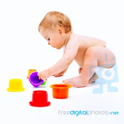 Cute Infant Boy With Toys Stock Photo