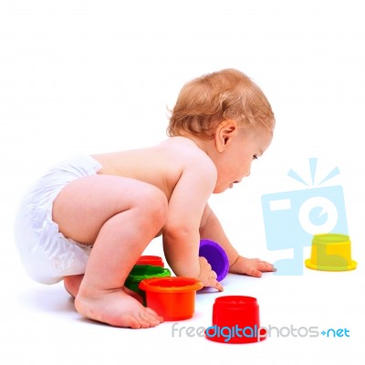 Cute Infant Boy With Toys Stock Photo