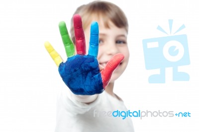 Cute Kid Showing Her Colored Hand Stock Photo