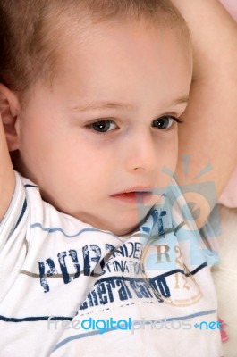 Cute Little Boy Lying Stock Photo