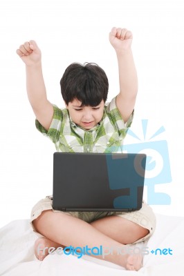 Cute Little Boy With Laptop Stock Photo