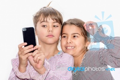 Cute Little Girls Making Selfie Stock Photo