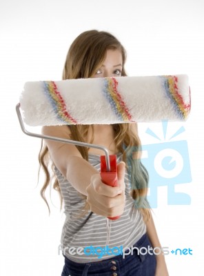 Cute Teen Girl Showing Roller Brush Stock Photo