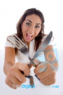 Cute Teenager Showing Cutlery Stock Photo