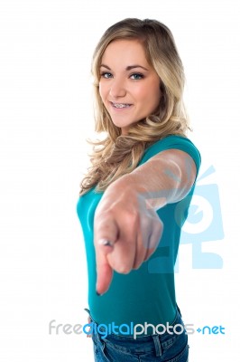 Cute Young Girl Pointing You Out Stock Photo