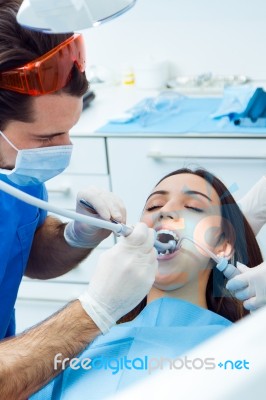 Cute Young Woman At The Dentist. Mouth Checkup Stock Photo