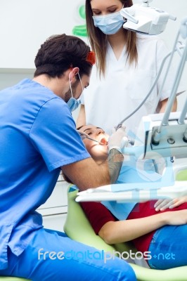 Cute Young Woman At The Dentist. Mouth Checkup Stock Photo