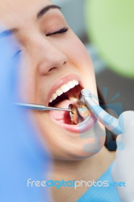 Cute Young Woman At The Dentist. Mouth Checkup Stock Photo