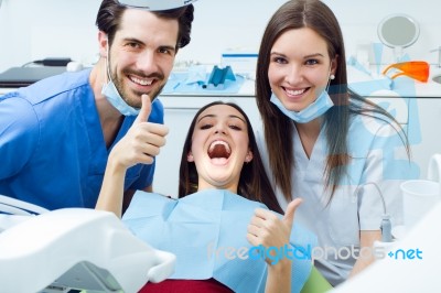 Cute Young Woman At The Dentist. Mouth Checkup Stock Photo