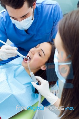 Cute Young Woman At The Dentist. Mouth Checkup Stock Photo