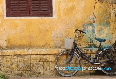 Cycle Standing On Old House Stock Photo