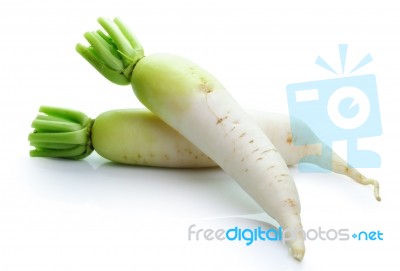 Daikon Radishes Isolated On White Background Stock Photo