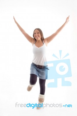 Dancing Model With Raised Arms Stock Photo