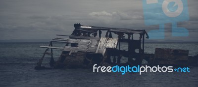 Dark And Gloomy Effect On The Shipwrecks At Tangalooma Island Stock Photo