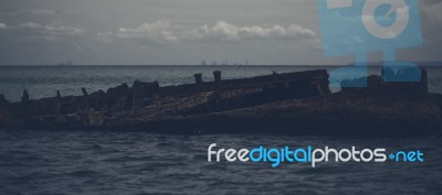 Dark And Gloomy Effect On The Shipwrecks At Tangalooma Island Stock Photo