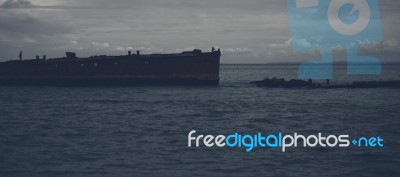 Dark And Gloomy Effect On The Shipwrecks At Tangalooma Island Stock Photo