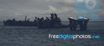 Dark And Gloomy Effect On The Shipwrecks At Tangalooma Island Stock Photo