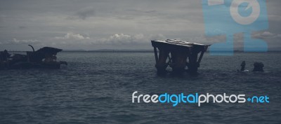 Dark And Gloomy Effect On The Shipwrecks At Tangalooma Island Stock Photo