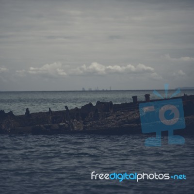 Dark And Gloomy Effect On The Shipwrecks At Tangalooma Island Stock Photo