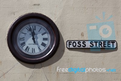 Dartmouth, Devon/uk - July 28 : Clock On The Wall In Foss Street… Stock Photo