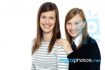 Daughter Resting Hands On Mothers Shoulders Stock Photo