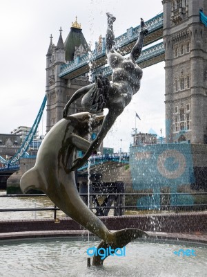 David Wayne Sculpture Girl With The Dolphin Next To Tower Bridge… Stock Photo