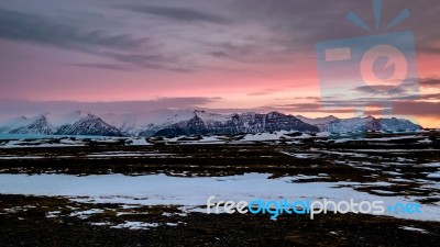 Dawn Breaking Near Jokulsarlon Stock Photo