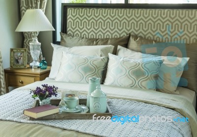 Decorative Tray With Book,tea Set And Flower On The Bed Stock Photo