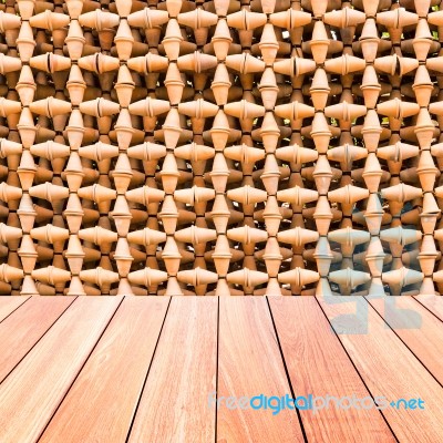 Decorative Wall Of Pottery Pots With Plank Wood Floor Stock Photo