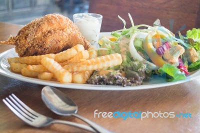 Deep Fried Chicken Meat With Organic Salad Stock Photo