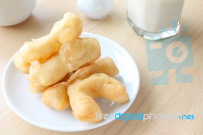 Deep Fried Doughstick Breakfast On Morning Table Stock Photo