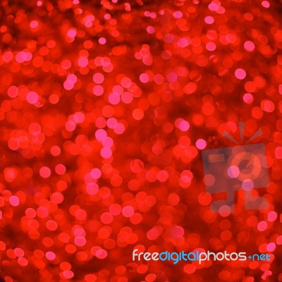 Defocused Red Abstract Christmas Background With Bokeh Effect Stock Photo