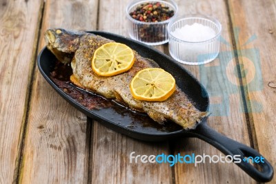 Delicious Baked Rainbow Trout Straight From The Oven With Lemon Stock Photo