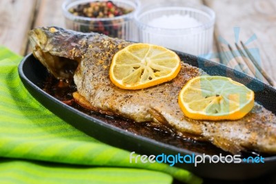 Delicious Baked Rainbow Trout With Lemon Straight From The Oven Stock Photo