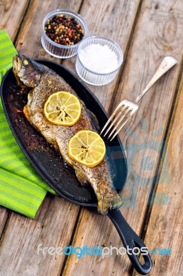 Delicious Baked Rainbow Trout With Lemon Straight From The Oven Stock Photo